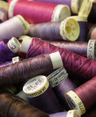 Purple and pink threads (photo by Mary Taylor)